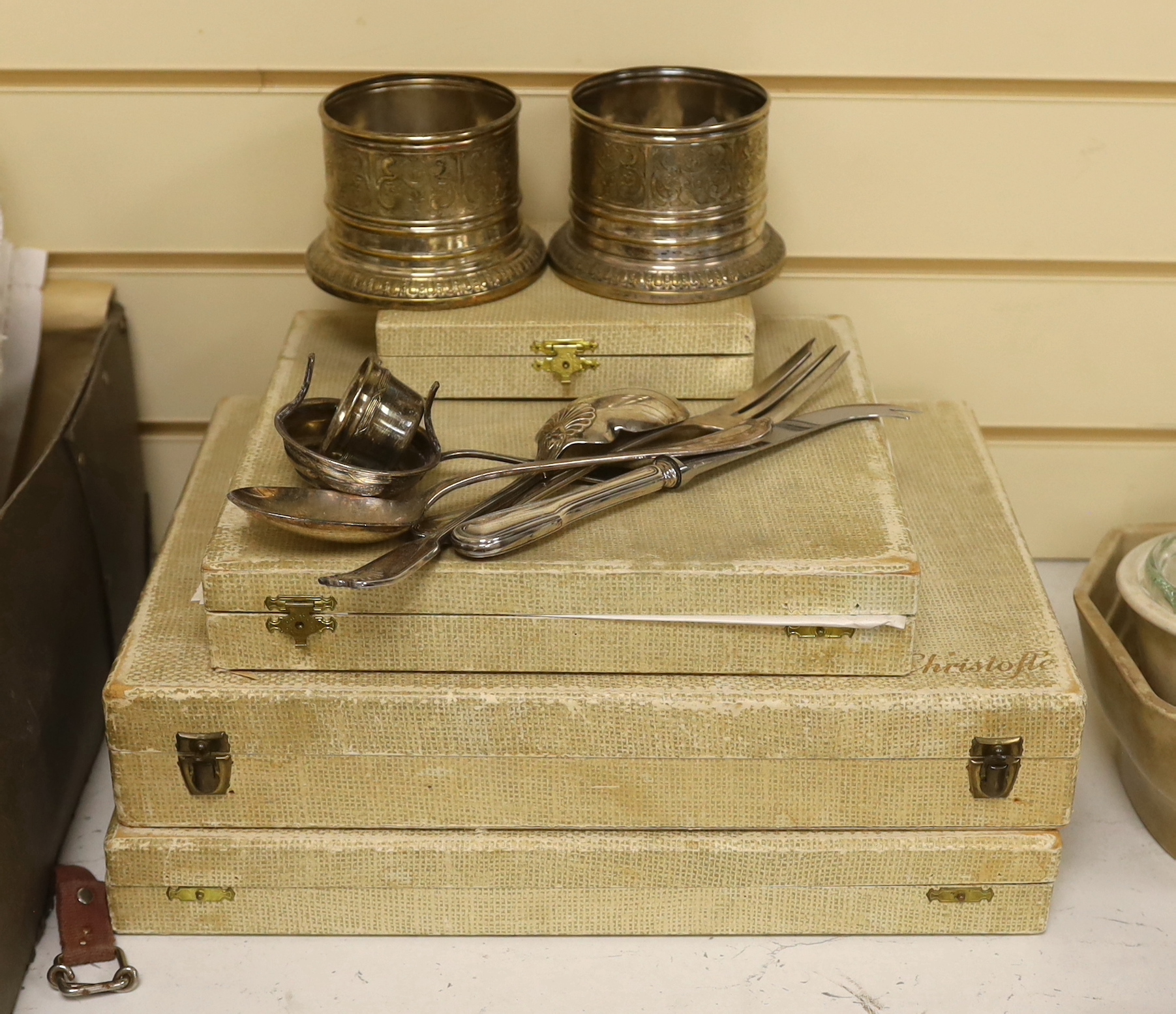A pair of WMF coasters and two Christofle canteens of cutlery etc
